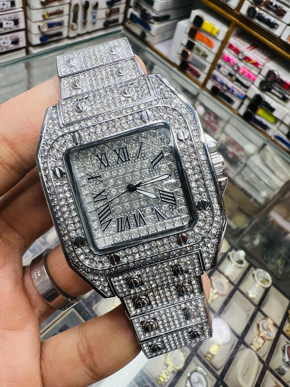 Iced out Roman Dial. Skim Case with Date Butterfly lock By MWC